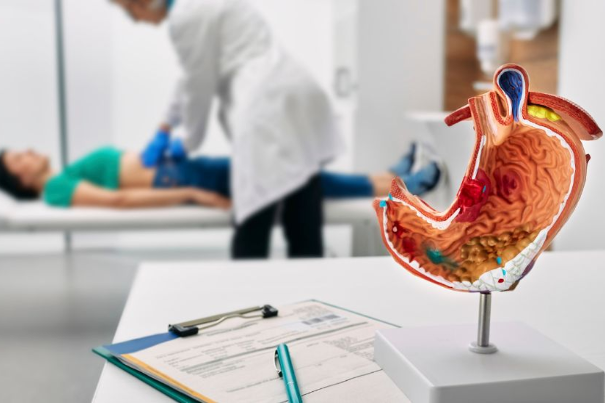 Doctor reviewing digestive health reports